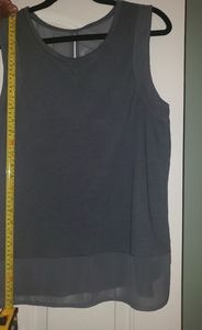 Ladies cute sleeveless top w/sexy opening in back